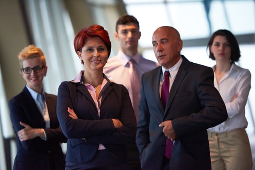 diverse business people group with redhair  woman in front photo