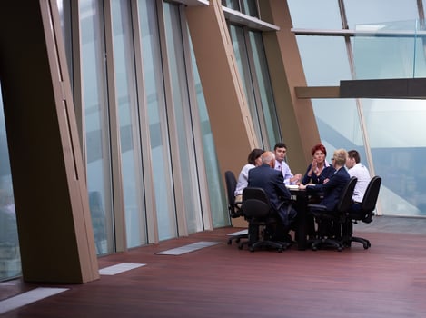 business people group on meeting at modern bright office photo