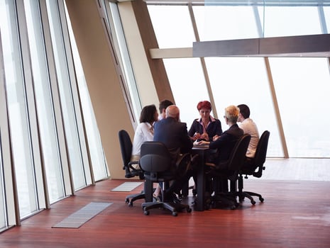 business people group on meeting at modern bright office photo