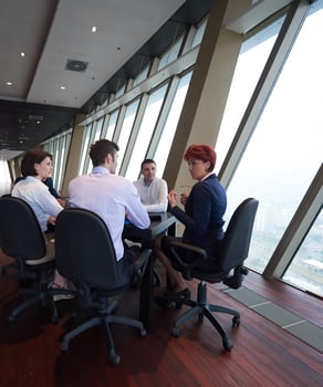 business people group on meeting at modern bright office photo