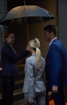business people couple entering  hotel photo