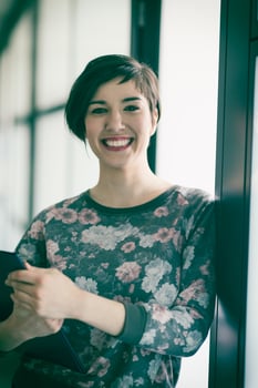 portrait of business woman in casual clothes at startup office photo