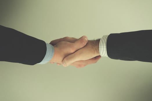 cloasing the deal in modern office interior top view photo