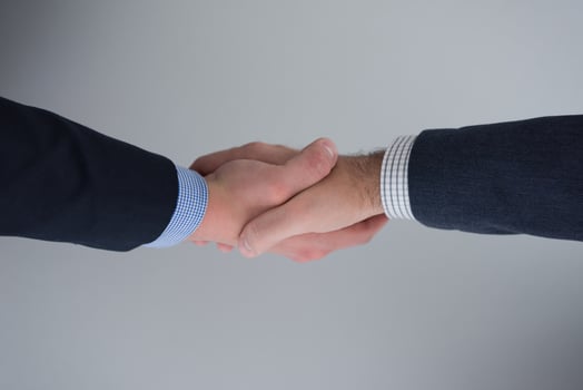 cloasing the deal in modern office interior top view photo