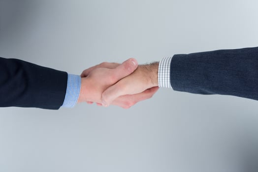 cloasing the deal in modern office interior top view photo