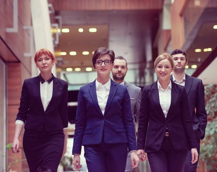 business people team walking photo