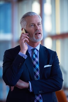 senior business man talk on mobile phone photo