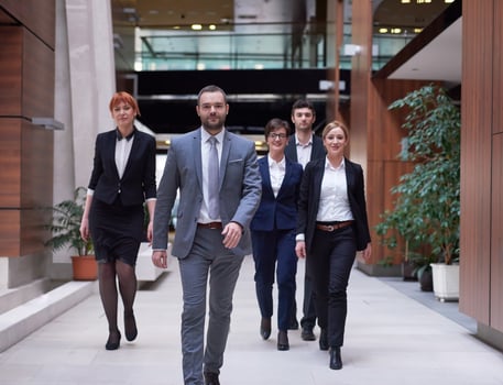 business people team walking photo