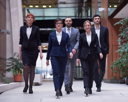 business people team walking photo