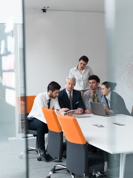 business people group on meeting at modern startup office photo