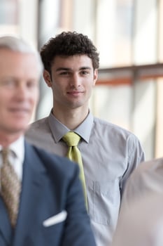 portrait of young business man at modern office photo