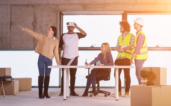 group of multiethnic business people on construction site photo