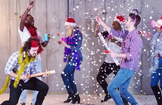 multiethnic group of casual business people having confetti party photo