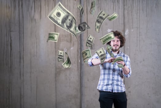 businessman making the rain of money photo