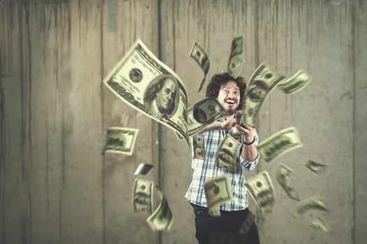 businessman making the rain of money photo
