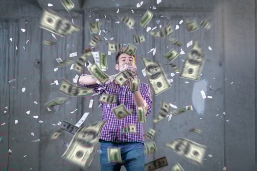 businessman making the rain of money photo