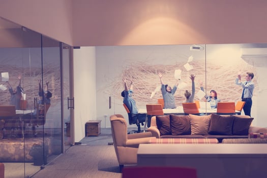 Group of young business people throwing documents photo