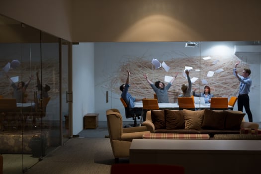 Group of young business people throwing documents photo