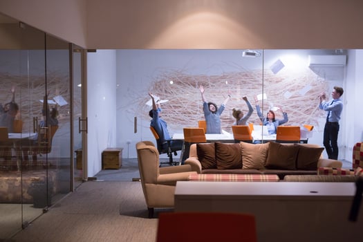Group of young business people throwing documents photo