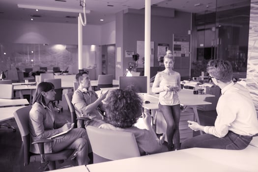 Young Business Team At A Meeting at modern office building photo