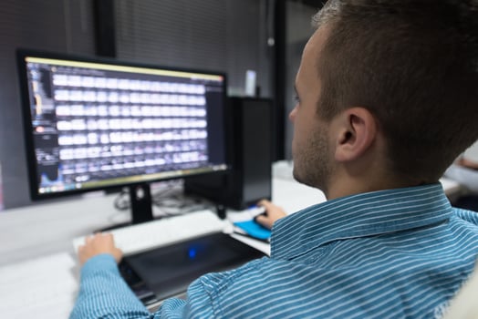 photo editor at his desk