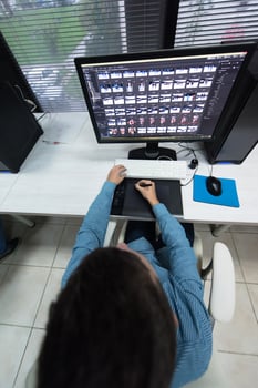photo editor at his desk