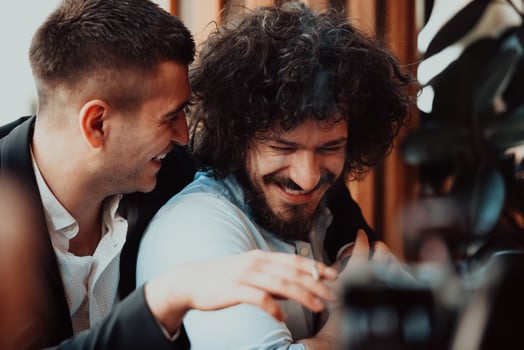 Diverse friends gay couple hugging. Stylish cool generation z men dating in love enjoy romantic relationships photo