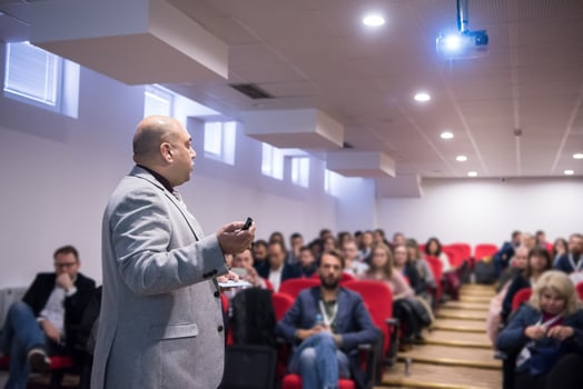 successful businessman giving presentations at conference room photo