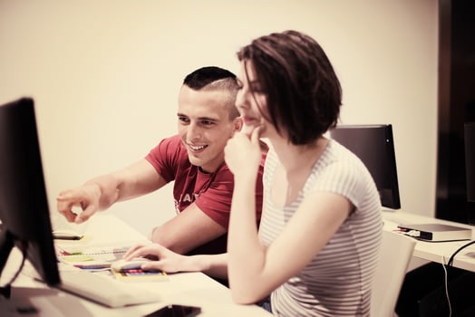 technology students group working  in computer lab school  classroom photo
