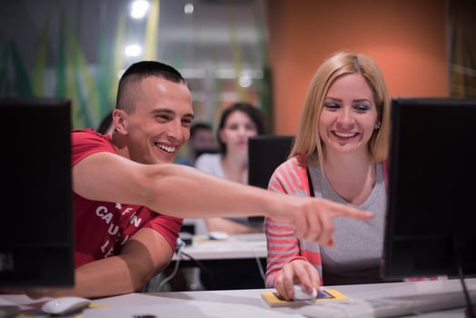 technology students group working  in computer lab school  classroom photo