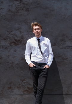 portrait of startup businessman in a white shirt with a tie photo