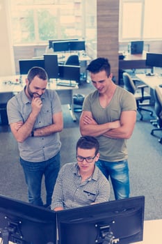 startup business people group working as team to find solution photo