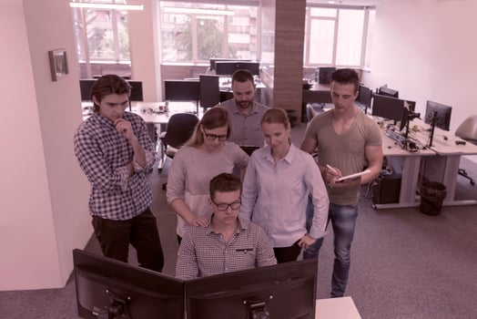 startup business people group working as team to find solution photo