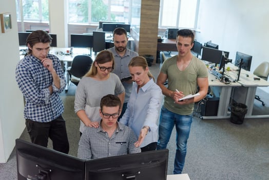 startup business people group working as team to find solution photo