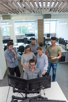startup business people group working as team to find solution photo