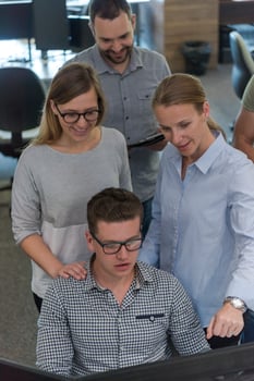 startup business people group working as team to find solution photo