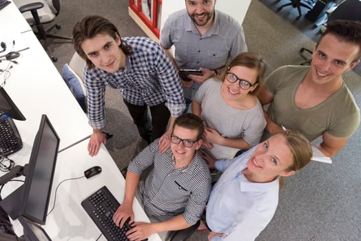 startup business people group working as team to find solution photo
