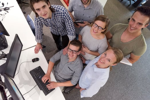 startup business people group working as team to find solution photo