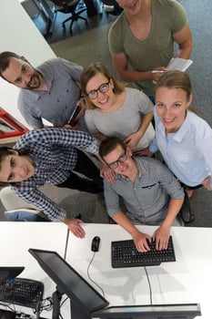 startup business people group working as team to find solution photo