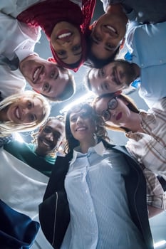 multiethnic Group of young business people celebrating success photo