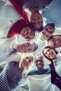 multiethnic Group of young business people celebrating success photo