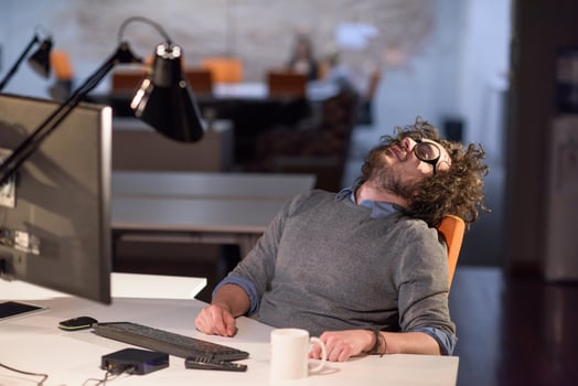 businessman relaxing at the desk photo