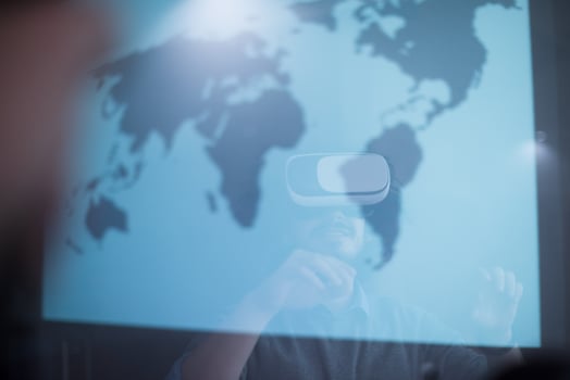 businessman using VR-headset glasses of virtual reality photo