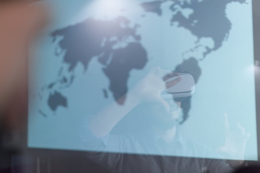 businessman using VR-headset glasses of virtual reality photo