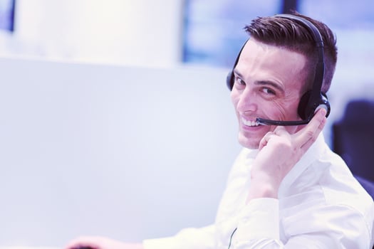 male call centre operator doing his job photo