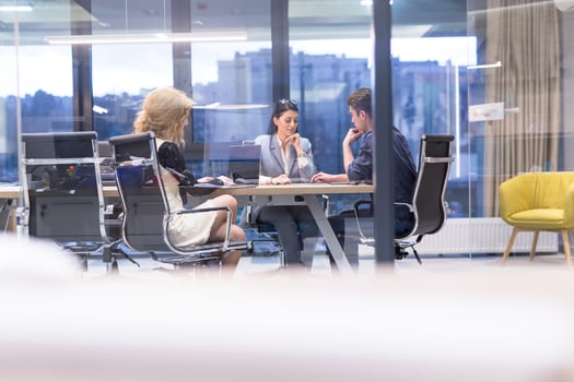 Startup Business Team At A Meeting at modern office building photo