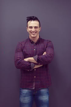 portrait of young startup business man in plaid shirt photo