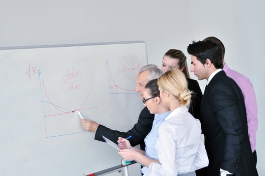 Senior business man giving a presentation photo