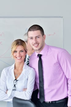 Group of young business people at meeting photo