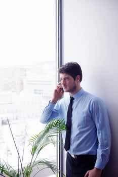 business man talking by cellphone photo